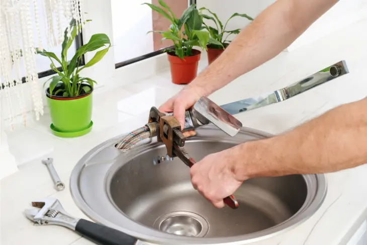 remove the faucet spout